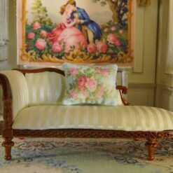 Miniature pillow featuring pink and red roses with golden scroll accents