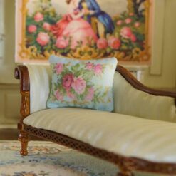 Miniature pillow featuring pink and red roses with golden scroll accents