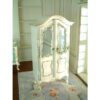 White dollhouse wardrobe with mirrored doors and gold embellishments