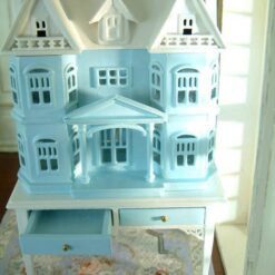 Pastel Blue Victorian Dollhouse Cabinet 10 Victorian-style dollhouse cabinet in pastel blue on a white table