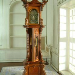 Miniature Grandfather Clock in Mahogany Finish 12 Miniature mahogany grandfather clock with intricate carvings