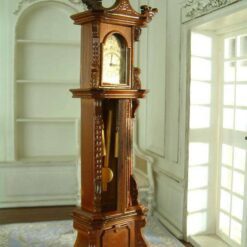 Miniature Grandfather Clock in Mahogany Finish 10 Miniature mahogany grandfather clock with intricate carvings