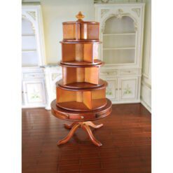 Miniature revolving wooden bookcase with mahogany finish