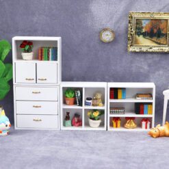 Set of four miniature wooden cabinets in various finishes for dollhouse storage