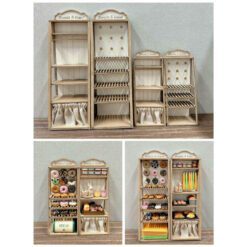 A miniature dollhouse bakery shelf kit with a detailed multi-tier design.