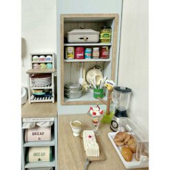 Double-Sided Dollhouse Corner Cabinet Kit 8 A double-sided corner cabinet kit for dollhouses, featuring open shelving and drawers.