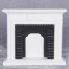 White Scandinavian style dollhouse fireplace with black interior and floral motif