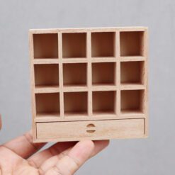 Miniature dollhouse cubby cabinet with 12 compartments and a single drawer
