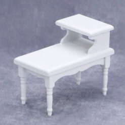 Scandinavian-style white miniature console table with a raised shelf.