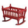 Miniature wooden rocking cradle for dollhouse nursery.