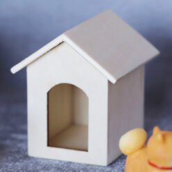 Miniature dog house model with white roof and white walls