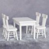 Miniature dining table with 4 chairs, perfect for dollhouse living spaces.