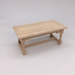 Miniature wooden dining table for dollhouses.
