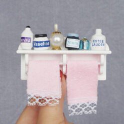Miniature towel rack with bathroom accessories and towels for dollhouses.Miniature towel rack with bathroom accessories and towels for dollhouses.Miniature towel rack with bathroom accessories and towels for dollhouses.