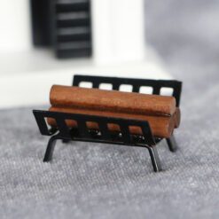 Miniature firewood rack with logs, ideal for dollhouse living rooms or outdoor settings.