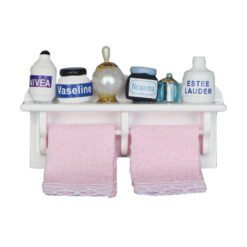 Miniature towel rack with bathroom accessories and towels for dollhouses.