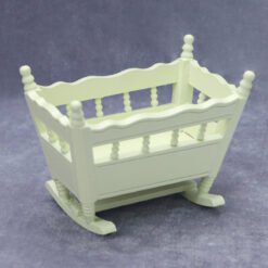 Miniature nursery furniture set including crib, cradle, high chair, and more.