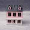 Miniature dollhouse in pastel colors with openable doors and roof, designed for 1/12 scale.