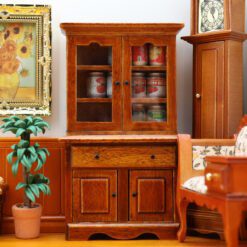 Miniature wooden storage cabinet with shelves and drawers for dollhouses.