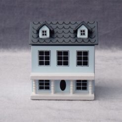 Miniature dollhouse in pastel colors with openable doors and roof, designed for 1/12 scale.